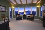 The master suite has a seating area and incredible views 
